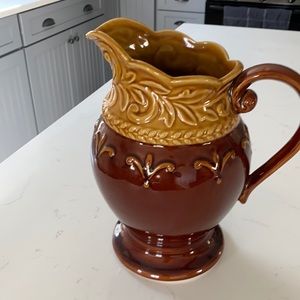 Decorative or drinking pitcher.